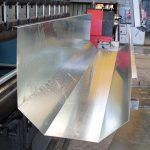 Cubierta en lamina para cortina enrollable